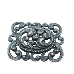 Elegant Silver-Toned Swirl Brooch